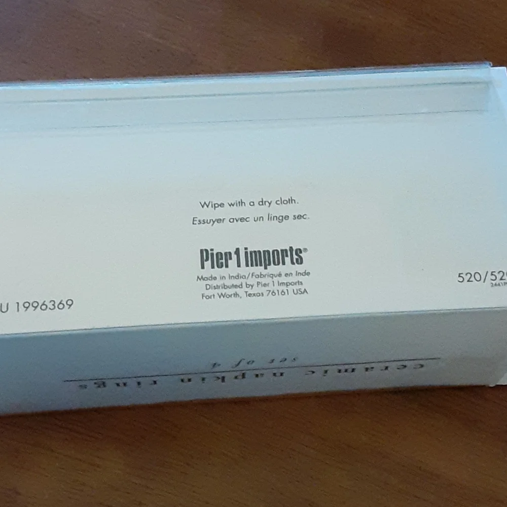 Pier 1 yellow blue green ceramic napkin rings set Of 4 LIKE NEW IN BOX